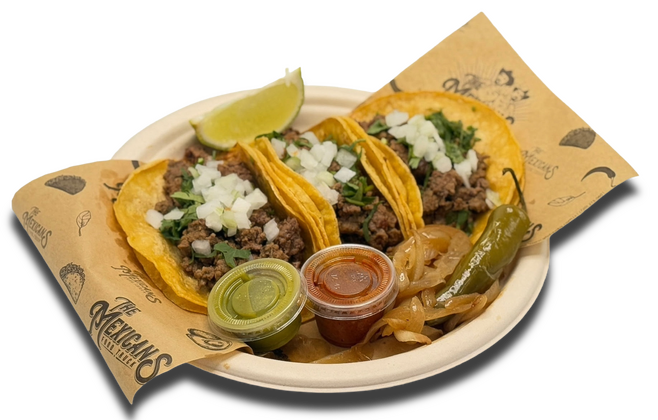 Three authentic Mexican street tacos with meat, onion and cilantro, served with lime and homemade salsa from The Mexicans Food Truck