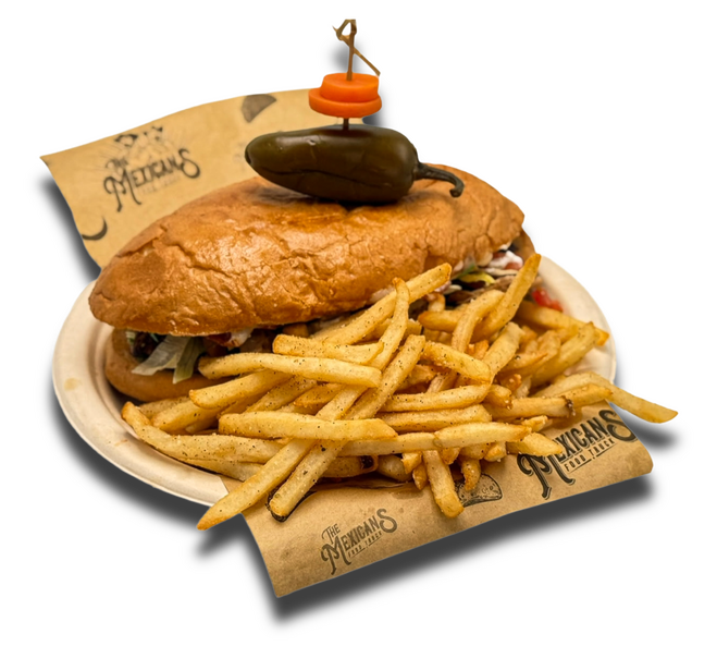 Mexican torta sandwich with meat, avocado, lettuce, tomato, and fries served on the side.